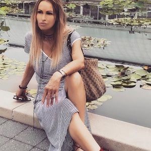 Black and white striped dress with slit.